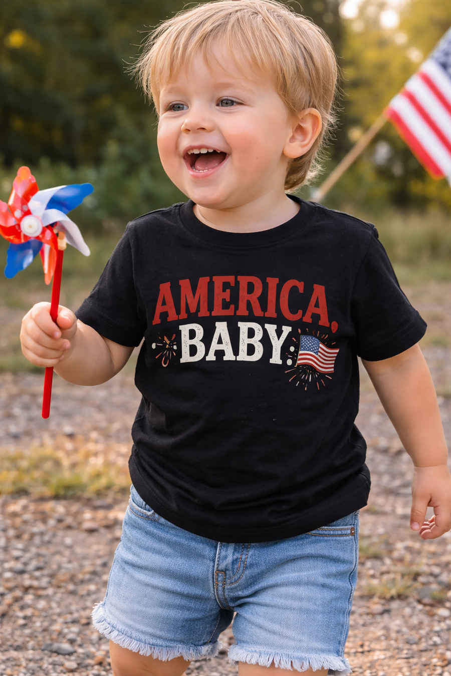 Toddler wearing an America baby tee